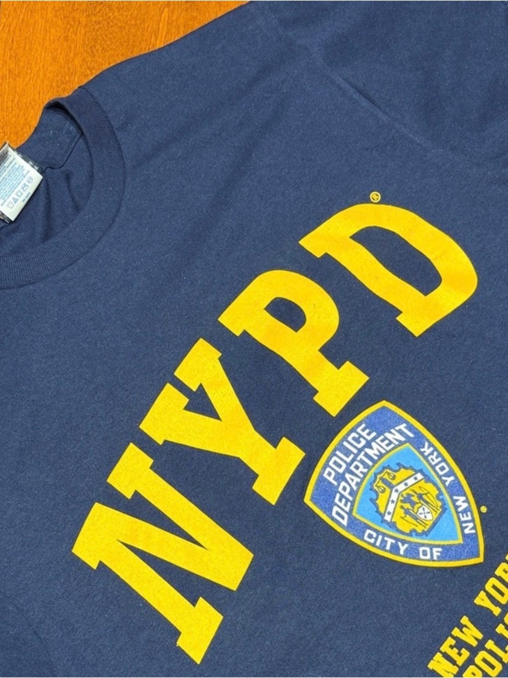NYPD Navy Blue Short Sleeve Tee with Bold Yellow NYPD Graphic